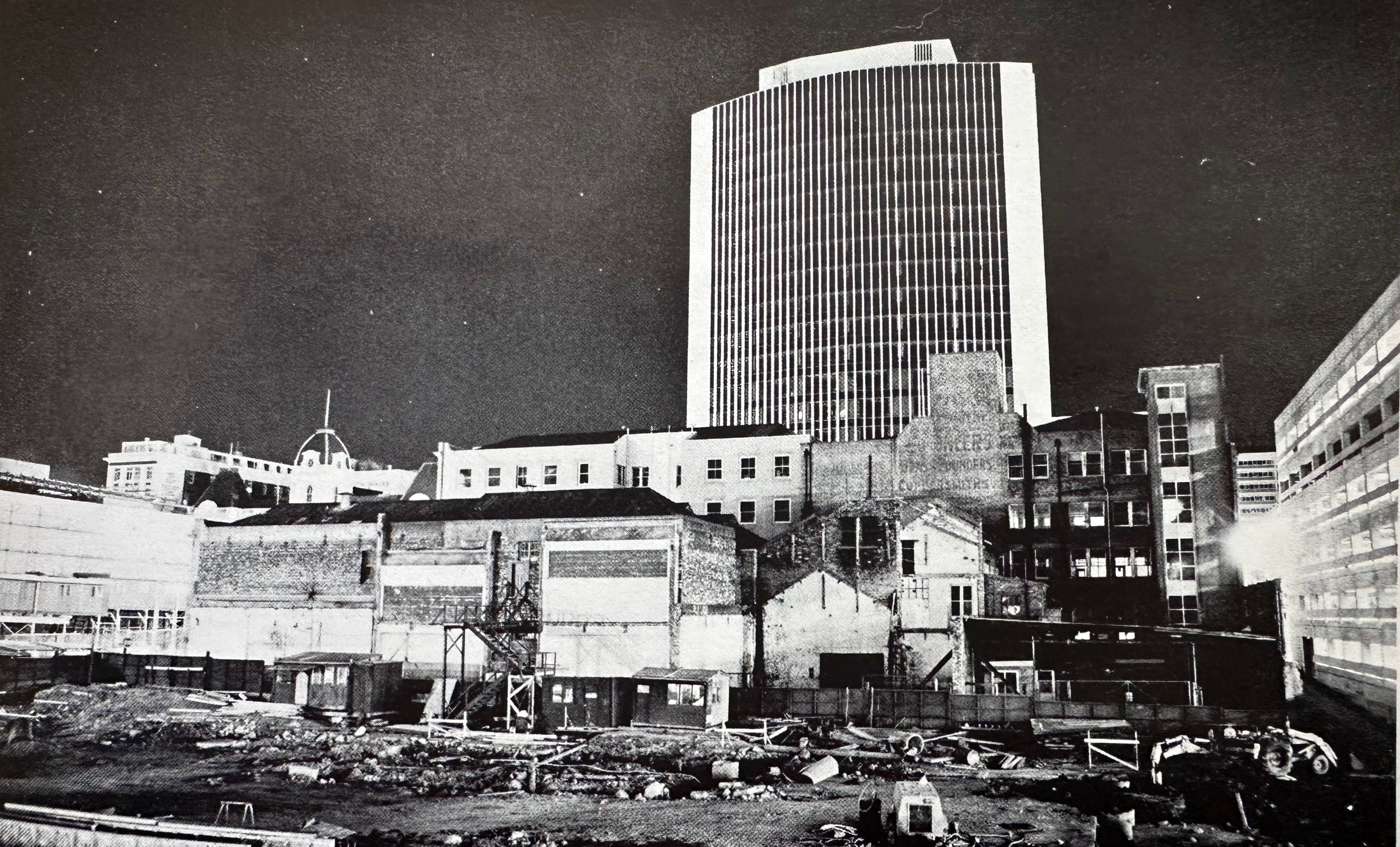 West Plaza Building at night with construction below Downtown Auckland 1974